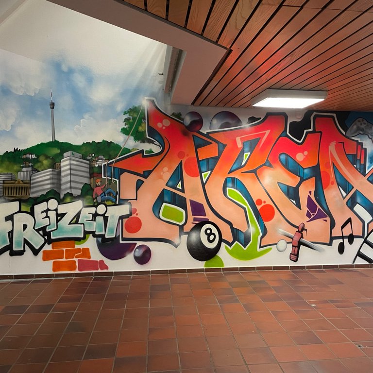 Das neues Graffiti für den Freizeitbereich bei der Nikolauspflege am Kräherwald in Stuttgart